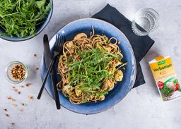 Spelt spaghetti met champignons en pijnboompitten